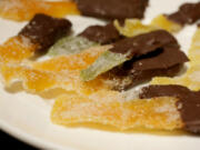 Candied Citrus Fruit Peels dipped in chocolate, Wednesday, March 23, 2022. (Hillary Levin/St.