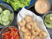 Cornstarch-dusted fried shrimp is the star of these easy-to-compose lettuce wraps with pickled veggies.
