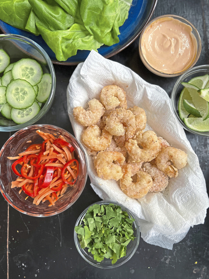 Cornstarch-dusted fried shrimp is the star of these easy-to-compose lettuce wraps with pickled veggies.