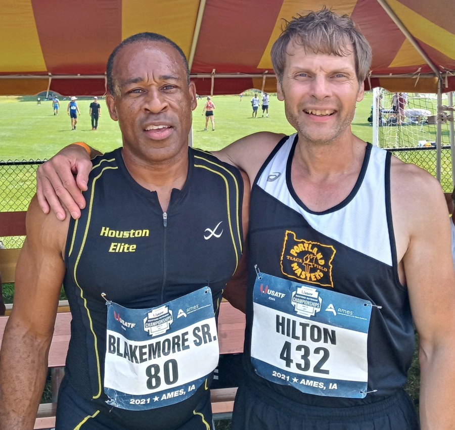 Ron Hilton, right, and Damon Blakemore pose for a photo at the 2021 USATF National Track and Field Championships in Ames, Iowa. Hilton, of Vancouver, won the 100-meter hurdles in the men's 55-59 division ahead of Blakemore in second place.