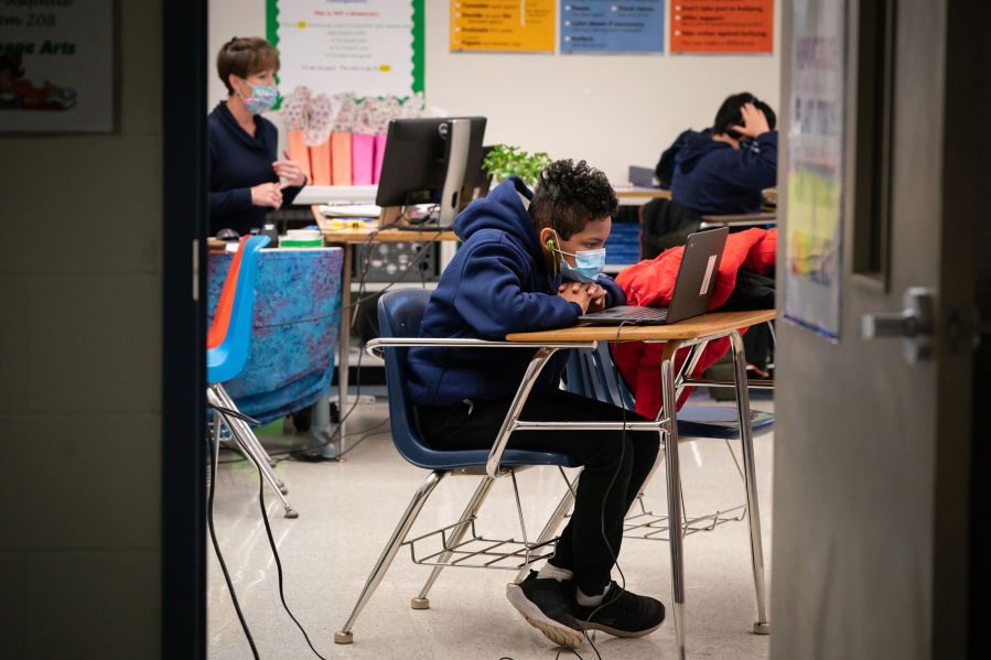 The pandemic has continued to alter some aspects of education, resulting in more widespread use of technology in districts like Pottstown. In this 2021 file photo, Pottstown Middle School students work on laptops at school.