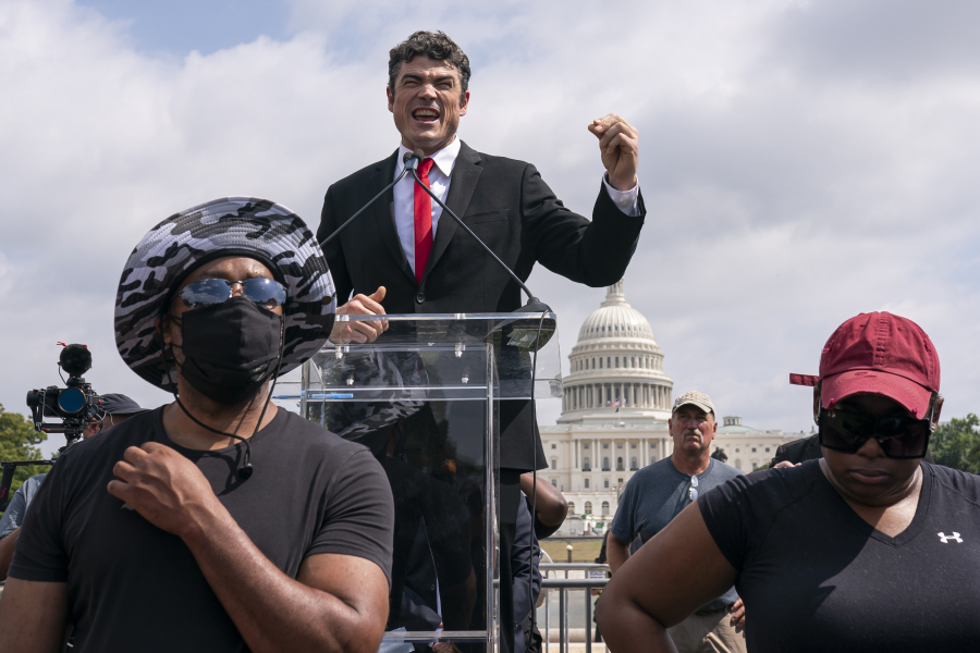 Joe Kent, a Republican primary candidate for Washington's 3rd Congressional's District, speaks during Justice For J6 rally, near the U.S. Capitol in Washington, Saturday, Sept. 18, 2021. The rally was planned by allies of former President Donald Trump and aimed at supporting the so-called "political prisoners" of the Jan. 6 insurrection at the U.S. Capitol.