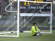 Hockinson goalkeeper Hale Prior saves a Washougal penalty kick attempt during the shootout on Friday.
