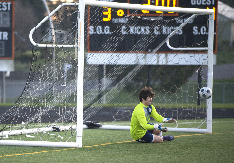 Hockinson goalkeeper Hale Prior saves a Washougal penalty kick attempt during the shootout on Friday.