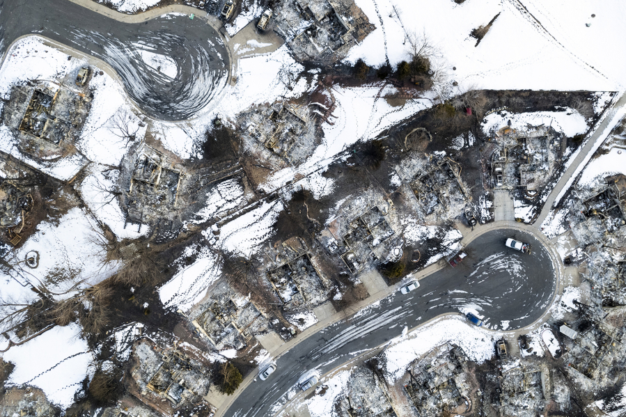 In this aerial view, burned homes sit in a neighborhood decimated by the Marshall fire on Jan. 4, 2022, in Louisville, Colorado.