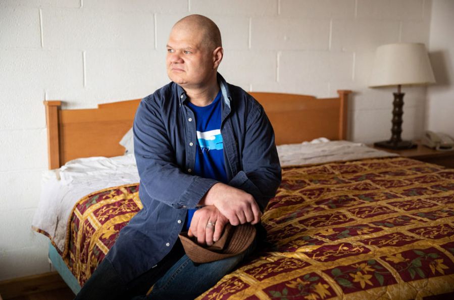 Jason Young inside his hotel room at San Juan Motel in Anacortes on Friday, March 25, 2022. Young was accused of stealing bicycles from the Port of Friday Harbor in 2019, based largely on what a deputy said he saw in a security video. Two years later, the deputy said his original statement about what he saw in the video was inaccurate. Young said while the case dragged on, his business working on cars dried up because no one on San Juan Island wanted to hire an accused thief. He and his partner are now homeless.