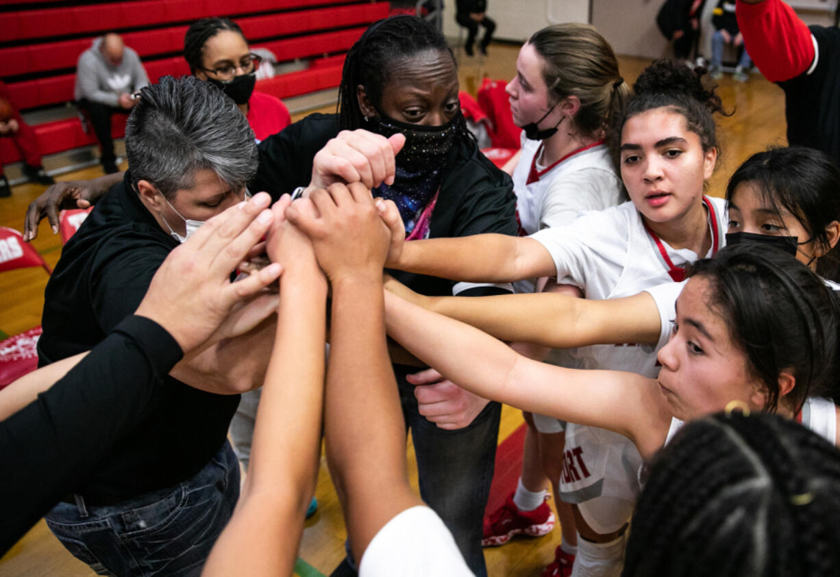 The Fort Vancouver girls basketball team huddles for a cheer during a timeout in a December nonleague contest against 1B Columbia Adventist. The Trappers went 2-15 last winter playing a modified schedule of league and independent opponents. The girls soccer program also played a modified schedule of subvarsity opponents and varsity opponents in lower classifications.