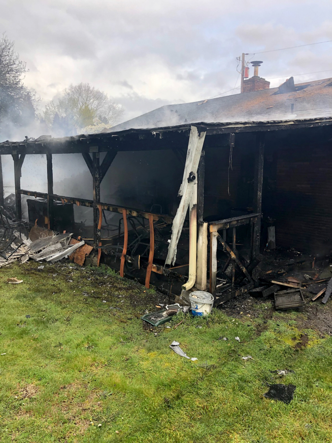 The back side of a house caught fire Monday afternoon in the Five Corners area. One person was displaced, but no one was injured.