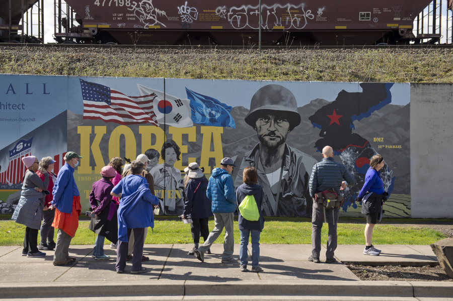 "The Remembrance Wall," or War Memorial, has been painted by many artists over the years. These pieces on Phil Arnold Way, on the north side of the railway berm in downtown Vancouver, pay tribute to George Marshall and the Korean War. They were sponsored by the Korean War Veterans Association, the Veterans of Foreign Wars and several individuals.