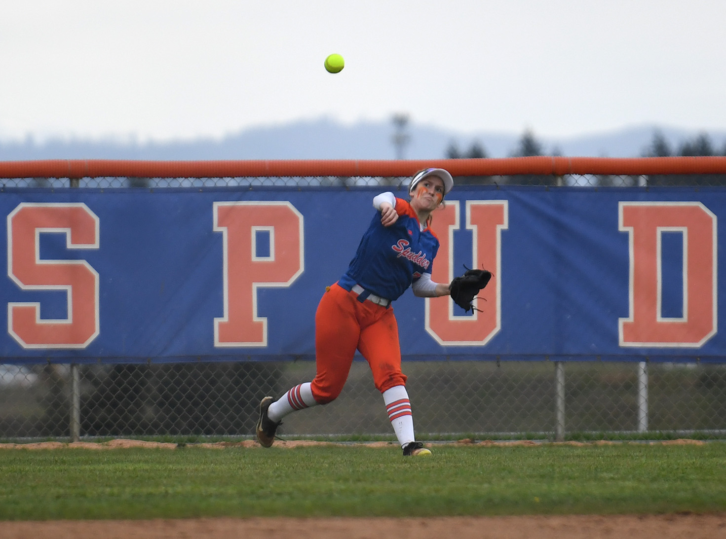 Ridgefield senior Alissa Wallway throws the ball Friday, April 1, 2022, during the Spudders’ 10-1 win against R.A. Longview at Ridgefield High School.