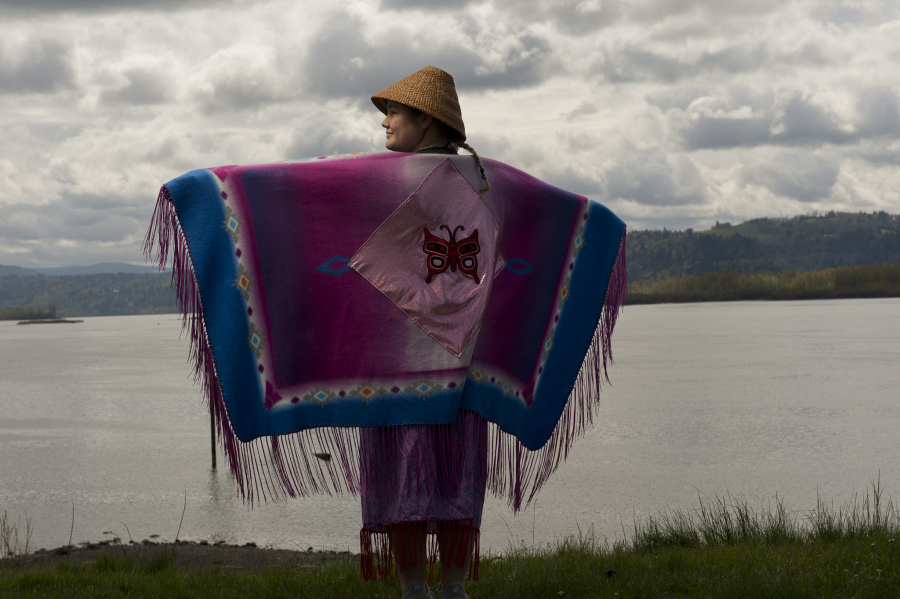 Chinook Indian Nation member and Union High School junior Destany Reeves-Robinson, 17, dances in her handmade butterfly regalia alongside the Washougal waterfront. "I love butterflies and I've been told I dance like a butterfly," she said. She's been lobbying for Chinook elders to make that her official tribal name.