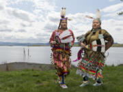 Yakama tribal member and Shahala Middle School student Mia Bennett, 13, left, will be one of the head dancers at Saturday's Traditional Pow Wow at Clark College. Her aunt, Aiyanna Bennett, 27, is a dance and culture instructor determined to keep Yakama culture alive.