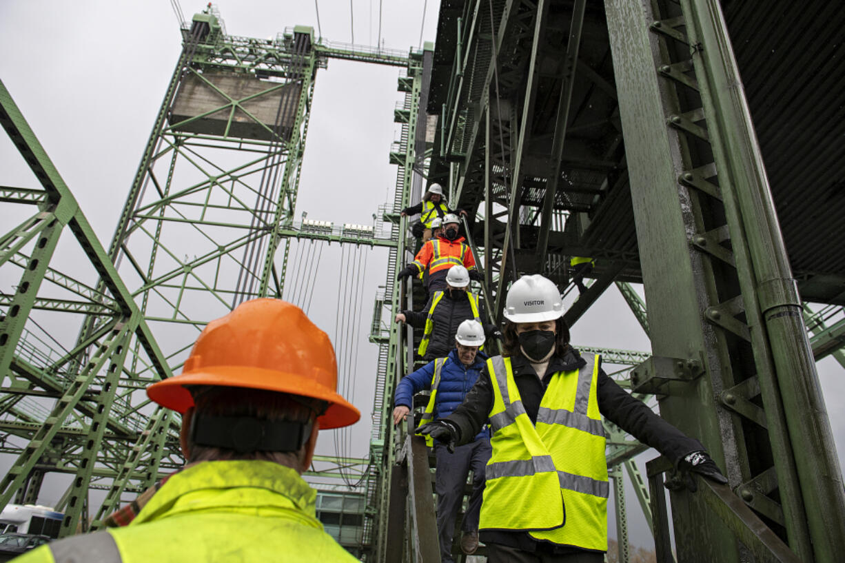 U.S. Sen. Maria Cantwell, right, joins officials and members of the media as she tours the Interstate Bridge Wednesday. The Democrat discussed federal infrastructure funding opportunities that could help fund a replacement bridge, which would be instrumental in boosting regional economies while relieving congestion.