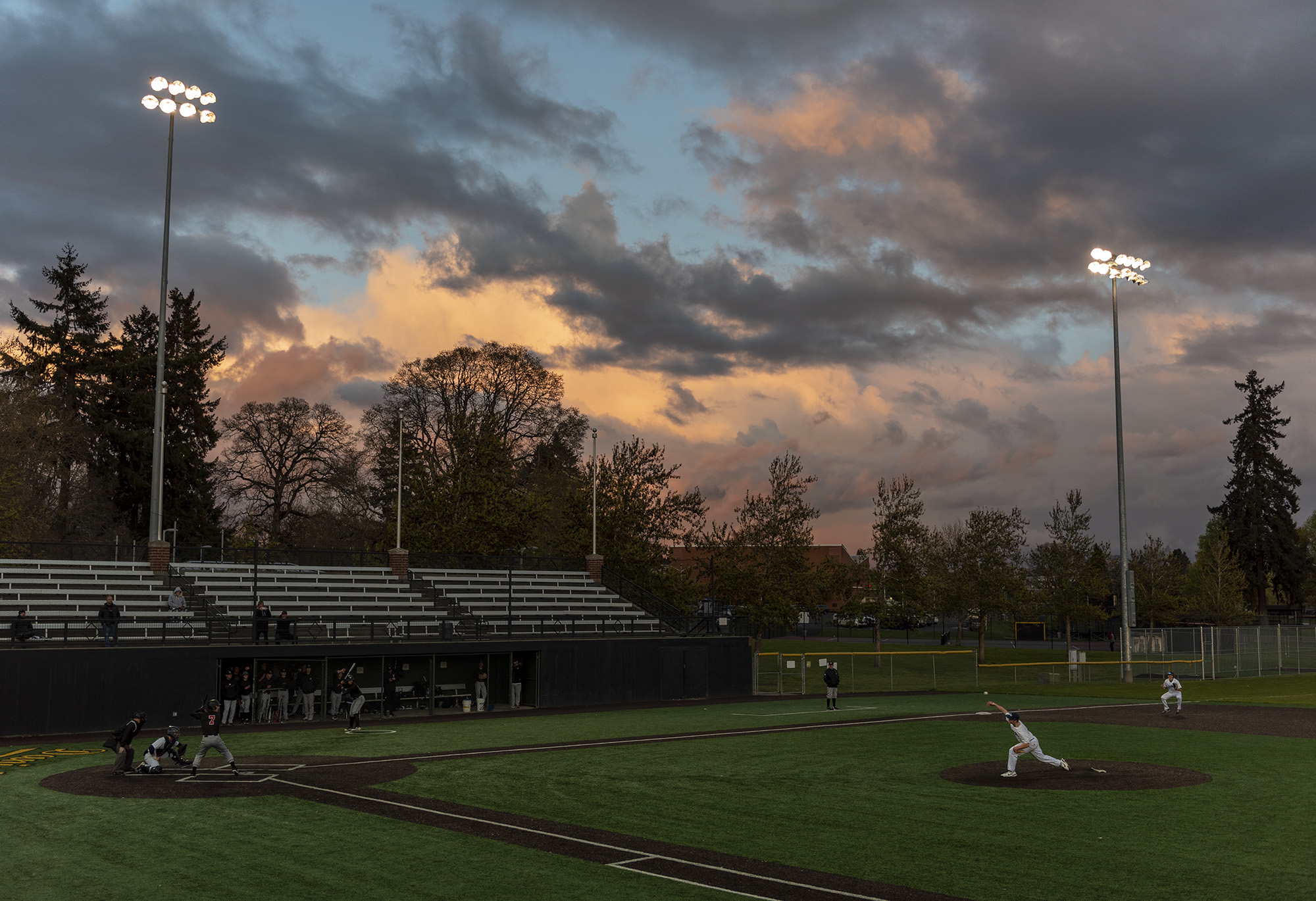 Colorful clouds hang above Propstra Stadium on Wednesday, April 13, 2022, during a baseball game between Union and Skyview.