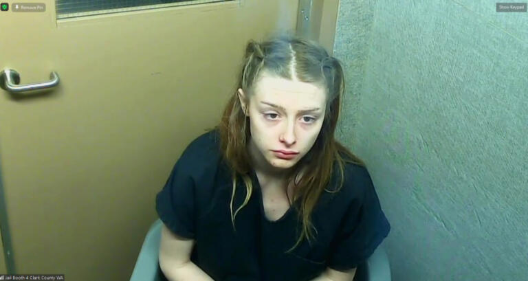 Chloey Cairns appears Friday in Clark County Superior Court on suspicion of three counts of possession of a controlled substance with the intent to deliver and one count of second-degree animal cruelty. Detectives searching a car during a drug investigation said they found a puppy zip-tied in a bag in the trunk.
