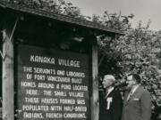 On the right, Kenneth Teter, once a Vancouver city councilman (1956-1963), stands beside an unidentified man examining an unfortunately worded sign (from today's perspective) donated by the Rotary Club describing the Hudson's Bay Company employees' village that once stood outside Fort Vancouver.
