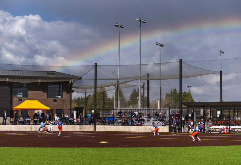 A rainbow hangs overhead Friday, April 22, 2022, during the Spudders’ 2-1 win against Columbia River at the Ridgefield Outdoor Recreation Complex.