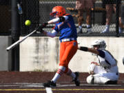 Ridgefield sophomore Mallory Vancleave hits the ball Friday, April 22, 2022, during the Spudders' 2-1 win against Columbia River at the Ridgefield Outdoor Recreation Complex.