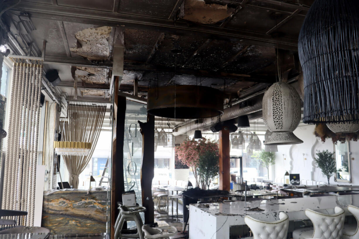The scorched interior of Diosa, a new Mexican restaurant that was scheduled to open in downtown Vancouver next week. Fire Marshal Heidi Scarpelli said the Thursday afternoon fire was caused by sparks from unpermitted pyrotechnic machines igniting a decoration on the ceiling of the restaurant.