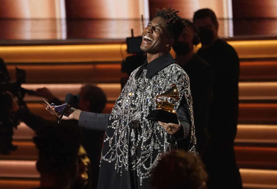 Jon Batiste accepts the award for album of the year for "We Are" at the 64th Annual Grammy Awards on Sunday, April 3, 2022, in Las Vegas.