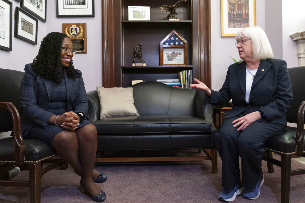 Supreme Court nominee Judge Ketanji Brown Jackson, left, listens as Sen. Patty Murray, D-Wash., right, speaks during a meeting in her office in Washington, Monday, March 14, 2022. Jackson's confirmation hearing starts March 21. If confirmed, she would be the court's first Black female justice.