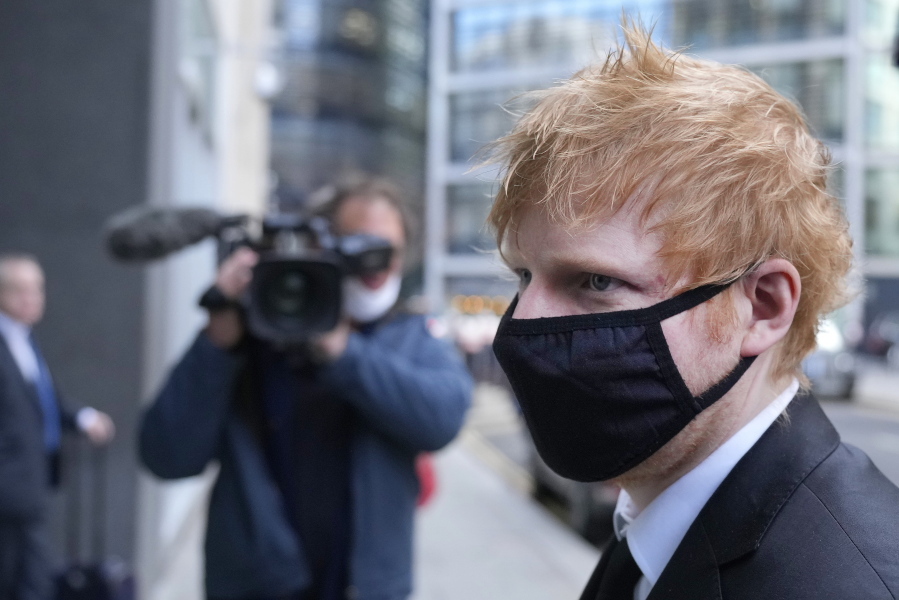 FILE - Musician Ed Sheeran arrives at the Rolls Building, High Court in central London, on March 15, 2022. Grammy Award-winning songwriter Ed Sheeran has won Wednesday, April 6, 2022, a U.K.