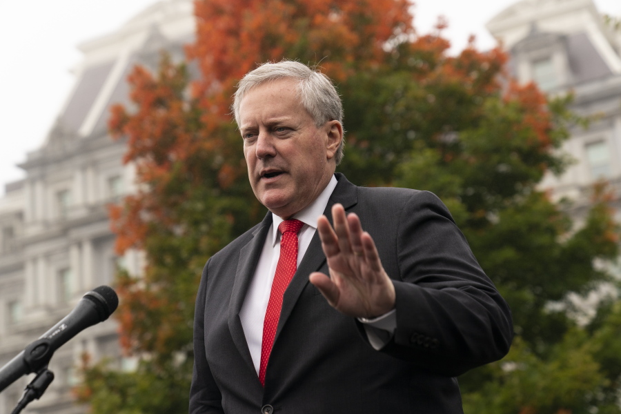 FILE - White House chief of staff Mark Meadows speaks with reporters at the White House, Wednesday, Oct. 21, 2020, in Washington. A former White House official told the House committee investigating the Jan. 6, 2021 insurrection at the U.S. Capitol that President Donald Trump's chief of staff, Mark Meadows, had been advised of intelligence reports showing the potential for violence that day, according to transcripts released late Friday night, April 22, 2022.