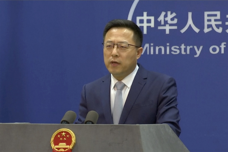 FILE - In an image taken from video, Chinese Foreign Ministry spokesperson Zhao Lijian speaks during a media briefing Thursday, March 10, 2022, in Beijing. India's power sector has been targeted by hackers in a long-term operation thought to have been carried out by a state-sponsored Chinese group, a U.S.-based private cybersecurity company detailed in a new report.