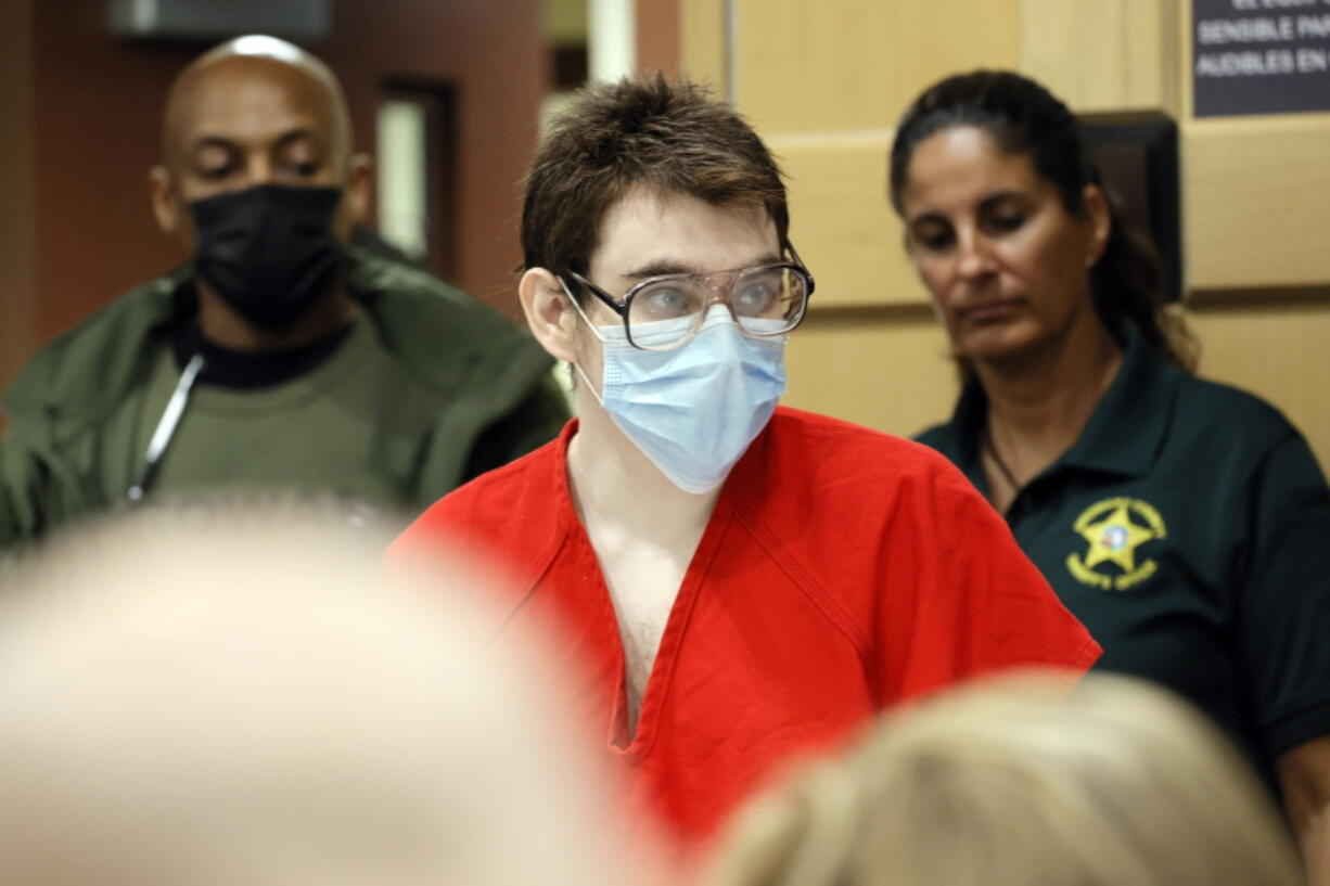 Nikolas Cruz enters the courtroom for a hearing at the Broward County Courthouse in Fort Lauderdale, Fla., on Wednesday, March 29, 2022. Cruz previously plead guilty to all 17 counts of premeditated murder and 17 counts of attempted murder in the 2018 shootings at Marjory Stoneman Douglas High School .