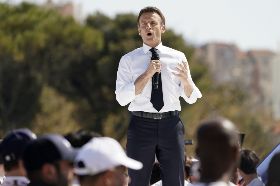 French President and centrist candidate Emmanuel Macron speaks during a campaign rally, Saturday, April 16, 2022 in Marseille, southern France. Far-right leader Marine Le Pen is trying to unseat centrist President Emmanuel Macron, who has a slim lead in polls ahead of France's April 24 presidential runoff election.