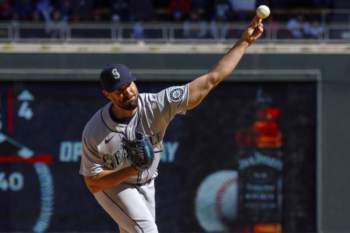 Seattle Mariners starting pitcher Robbie Ray (38) throws against the Minnesota Twins in the second inning of a baseball game, Friday, April 8, 2022, in Minneapolis.