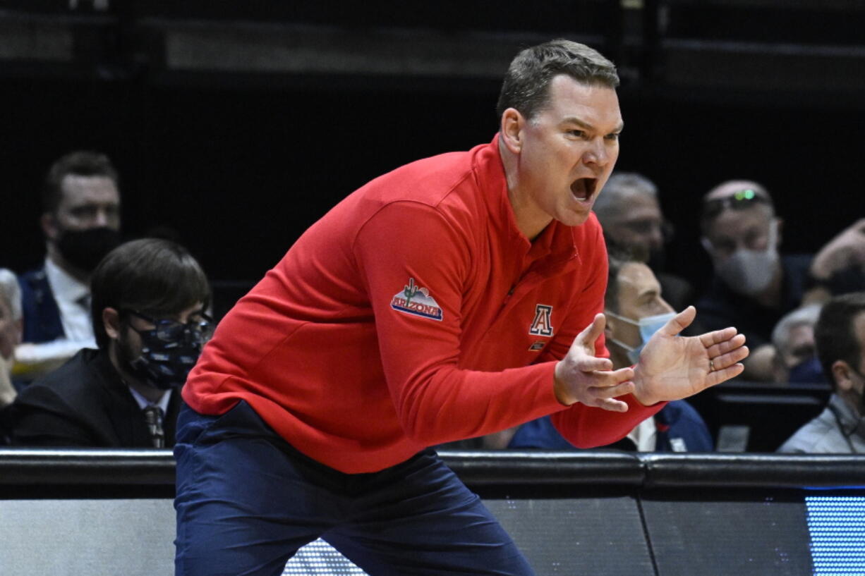 Arizona head coach Tommy Lloyd calls to his team during the first half of a second-round NCAA college basketball tournament game against TCU, Sunday, March 20, 2022, in San Diego.