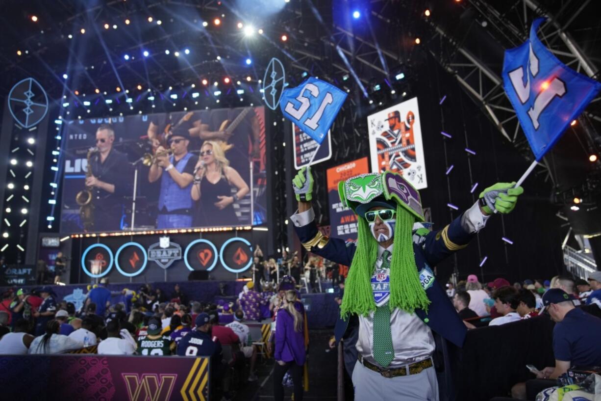 Seattle Seahawks fan Wallace Watts dances during the third day of the NFL draft Saturday, April 30, 2022, in Las Vegas.