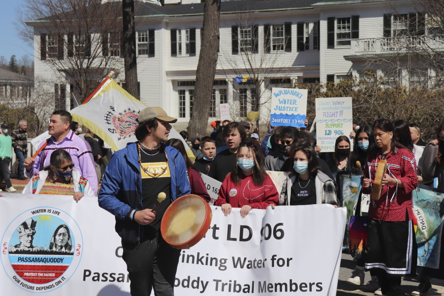 Native Americans marching in support of one of several tribal sovereignty bills pass by the governor's mansion on April 11, 2022, in Augusta, Maine. On Monday, April 18, 2022, the U.S. Supreme Court dealt the Penobscot Indian Nation a blow by rejecting its appeal over ownership and regulation of the tribe's namesake river.