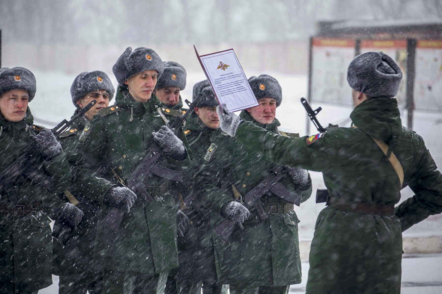 In this photo released by the Russian Defense Ministry Press Service on Jan. 22, 2022, servicemen of the engineer-sapper regiment take the military oath in the Voronezh Region, Russia.