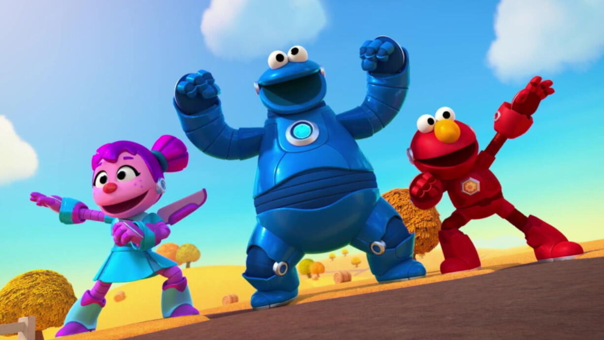 This image released by Sesame Workshop shows animated versions of "Sesame Street" characters Abby Cadabby, Cookie Monster, and Elmo from the new CGI-animated show "Mecha Builders." Each 11-minute episode begins with a problem -- a runaway train, a hurtling Earth-bound asteroid, a melting ice slide, a broken movie screen or a wayward boulder -- and the trio try a series of fixes, refining their ideas until they find an answer. The lesson is to always plan, test and solve.