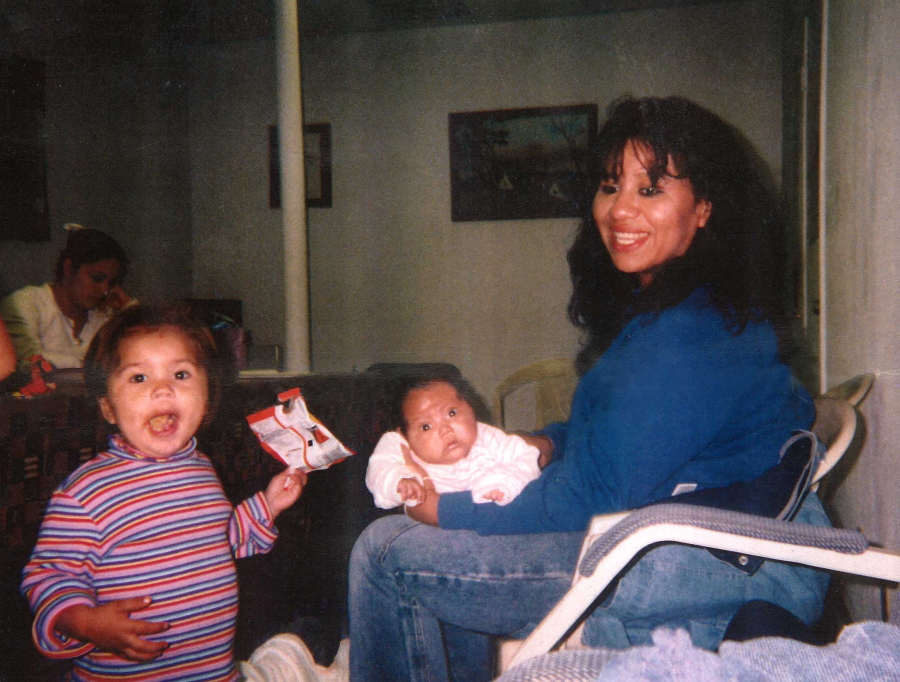 In this undated photograph, Texas death row inmate Melissa Lucio is holding her daughter Mariah, while one of her other daughters, Adriana, stands next to them. Lucio is set to be executed on April 27 for the 2007 death of Mariah. Prosecutors say Lucio fatally beat her 2-year-old daughter but Lucio has long denied that, saying Mariah died from injuries sustained during a fall down a flight of stairs. Her lawyers say Lucio's history of sexual and physical abuse led to her giving an unreliable confession. They hope to persuade the state's Board of Pardons and Paroles and Gov. Greg Abbott to either grant an execution reprieve or commute her sentence.