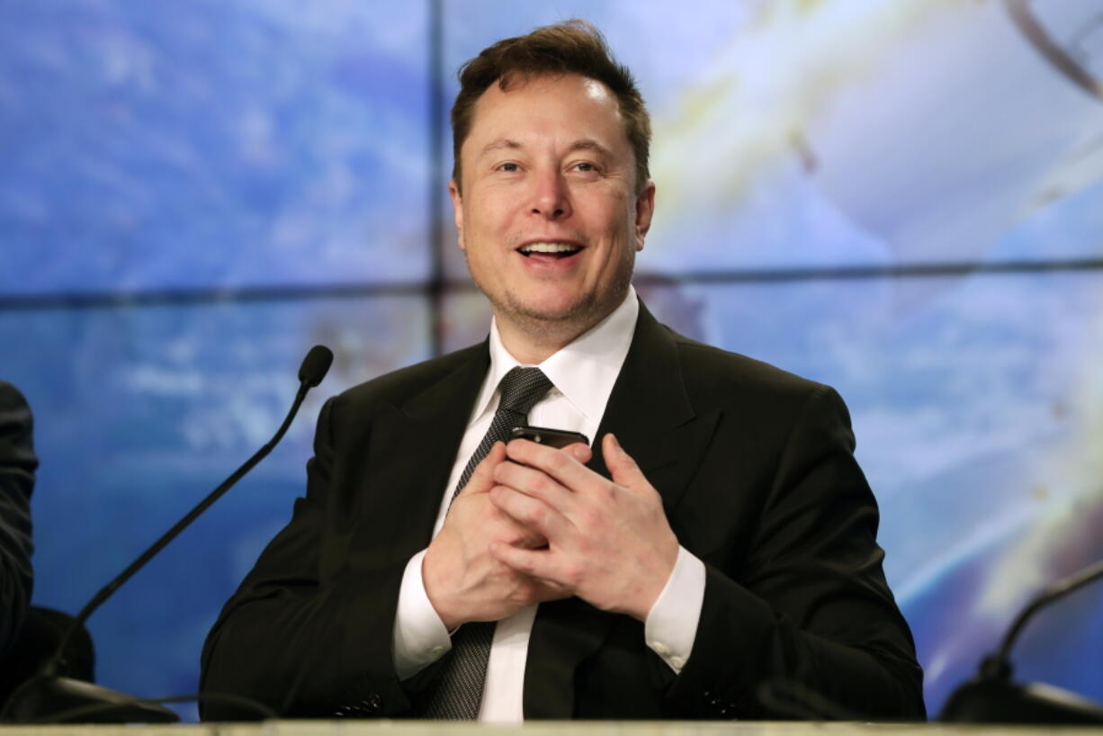 FILE - Elon Musk founder, CEO, and chief engineer/designer of SpaceX speaks during a news conference after a Falcon 9 SpaceX rocket test flight at the Kennedy Space Center in Cape Canaveral, Fla, Jan. 19, 2020. Musk won't be joining Twitter's board of directors as previously announced. The tempestuous billionaire remains Twitter's largest shareholder.
