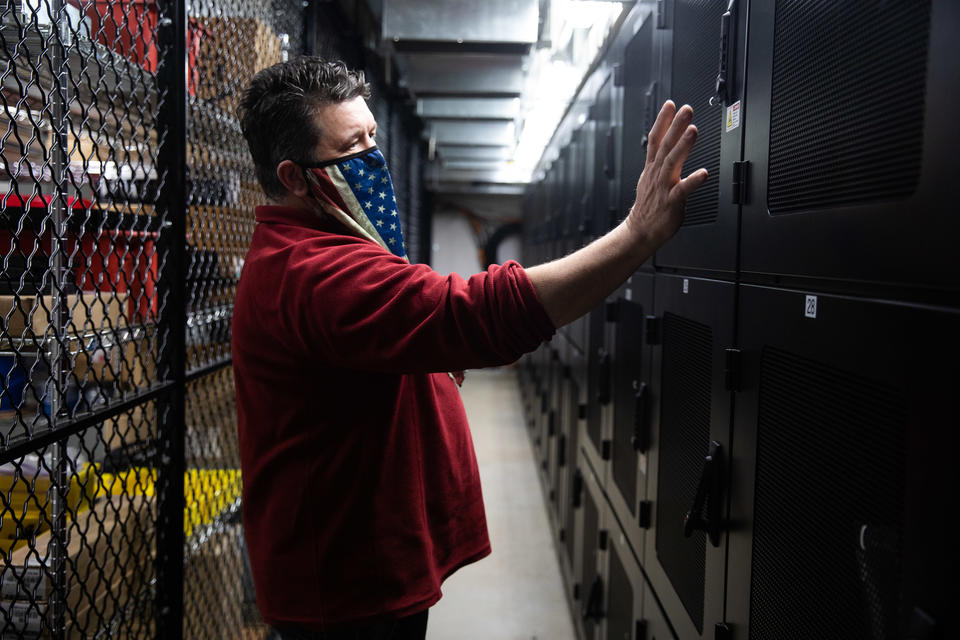 Michael Moore, an IT Construction Coordinator, is seen at a colocation data center is seen at Grays Harbor Pubic Utility District's headquarters in Aberdeen, Washington on March 4, 2021. (Matt M.