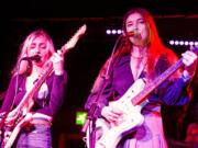 Hester Chambers, left, and Rhian Teasdale of British band Wet Leg perform at Night & Day Cafe in Manchester, England, on Oct. 23, 2021.