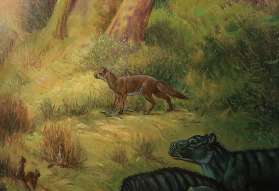 This painting at the San Diego Natural History Museum shows what the Archeocyons canid, center, would have looked like during the Oligocene era in what's now San Diego.