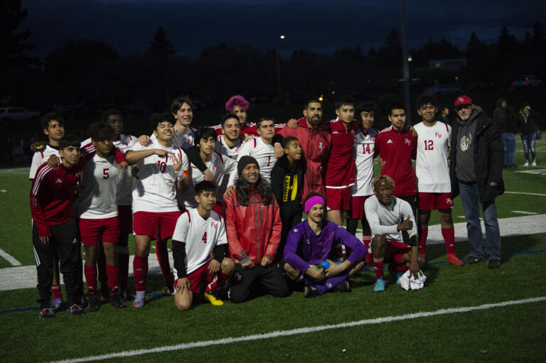 The Fort Vancouver boys soccer team celebrates clinching a home playoff match for the first time in 20 years with a 1-0 win over Hudson's Bay on Thursday, May 5, 2022.