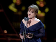 Patti LuPone accepts the Best Actress In A Supporting Role In A Musical award for "Company" on stage during The Olivier Awards 2019 with Mastercard at the Royal Albert Hall on April 7, 2019 in London, England.