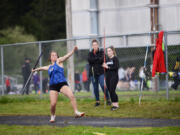 Ridgefield?s Kelli Krsul throws the javelin at the Spudder Track and Field Classic. The three-sport standout is completing her prep sports career with hopes of reaching the state meet.