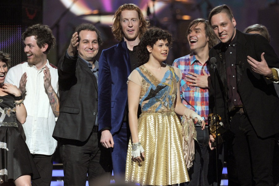 Arcade Fire accepts the Album of the Year Award for "The Suburbs" onstage during The 53rd Annual Grammy Awards on Feb. 13, 2011, in Los Angeles.
