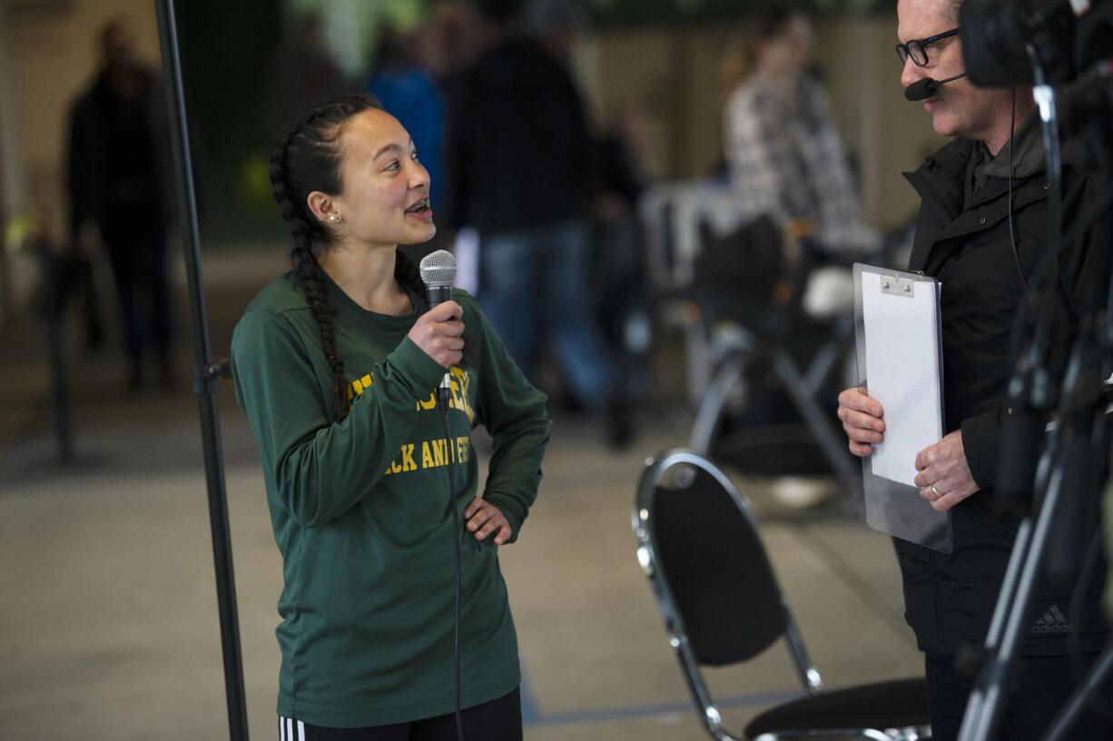 Evergreen's Grace Twiss does a post-race interview after winning the 3A girls 300-meter hurdles at the 4A/3A District 4 track and field meet at McKenzie Stadium on Thursday, May 12, 2022.
