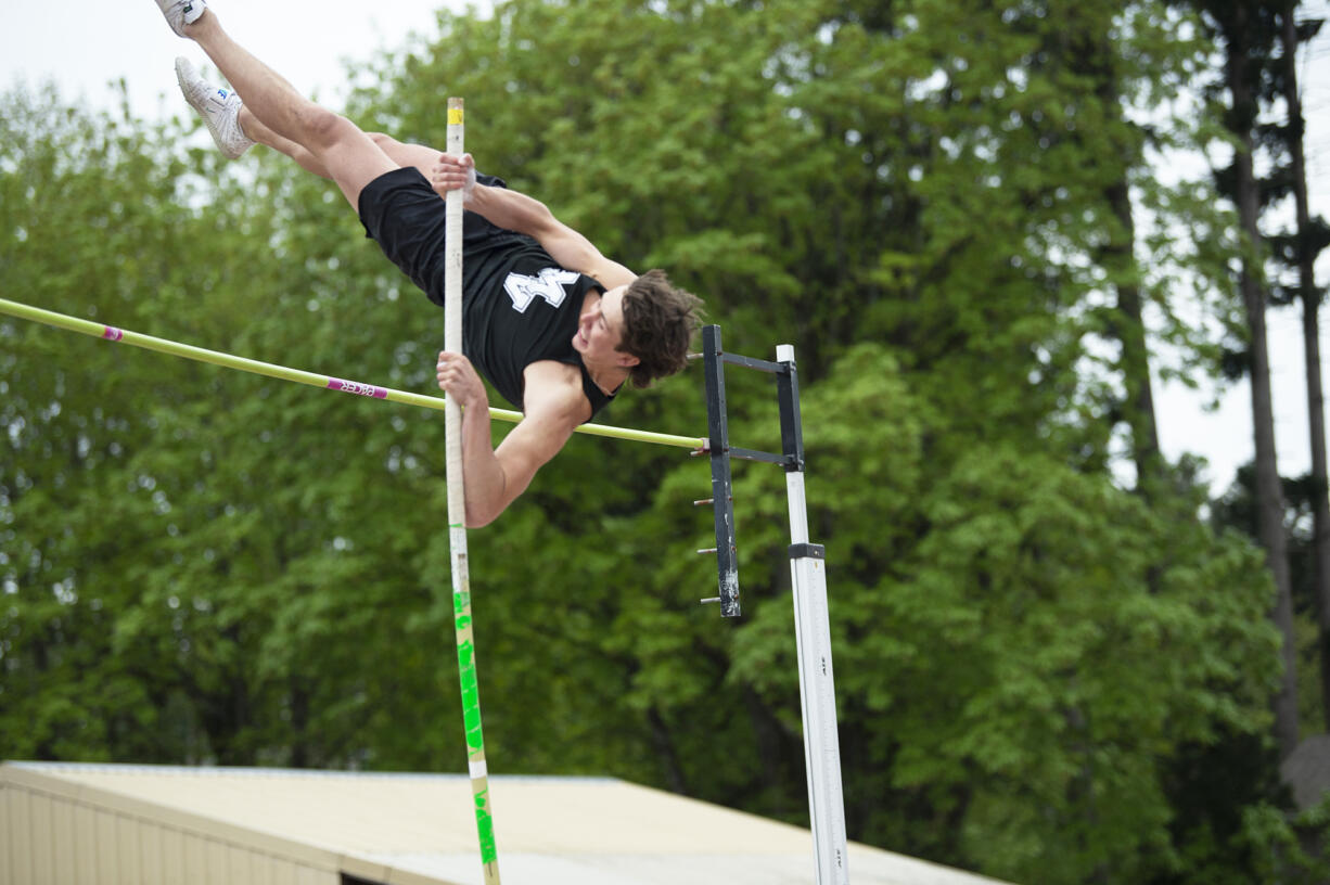 Mountain View's Xavier Wubbena clears the bar at 11 feet, 6 inches en route to winning the 3A boys pole vault at 13-6 at the 4A and 3A district track and field meet at McKenzie Stadium on Wednesday, May 11, 2022.