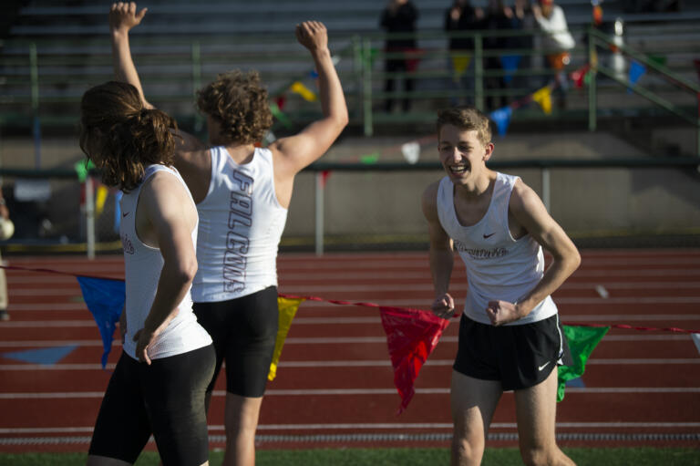 Members of the Prairie boys 4x400-meter relay team celebrate their win at the 4A/3A District 4 track and field meet at McKenzie Stadium on Thursday, May 12, 2022.