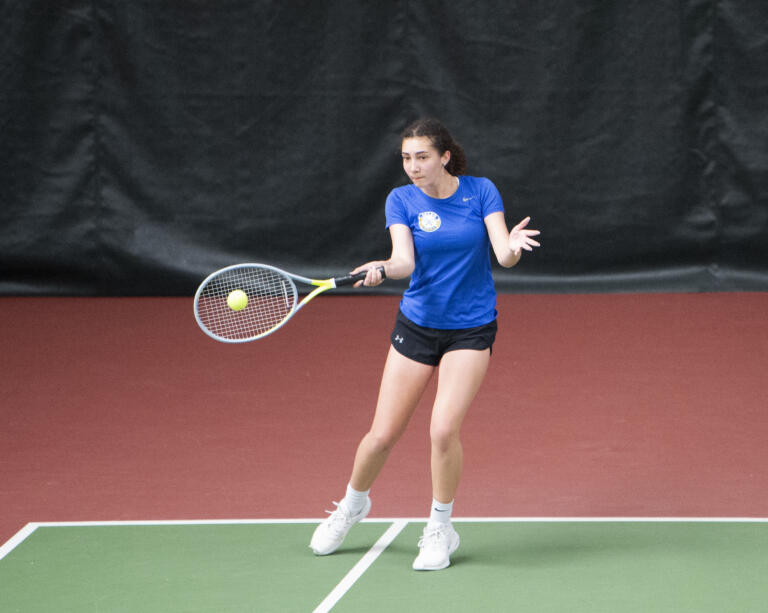 Kelso's Kamaile Correa returns a shot during the girls singles final at the 3A district tennis tournament at Club Green Meadows on Saturday, May 14, 2022.