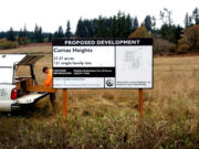 A sign, proposing a subdivision with 122 single-family homes, sits on a 37-acre parcel at 26630 N.E. 28th St., in north Camas, in 2021.